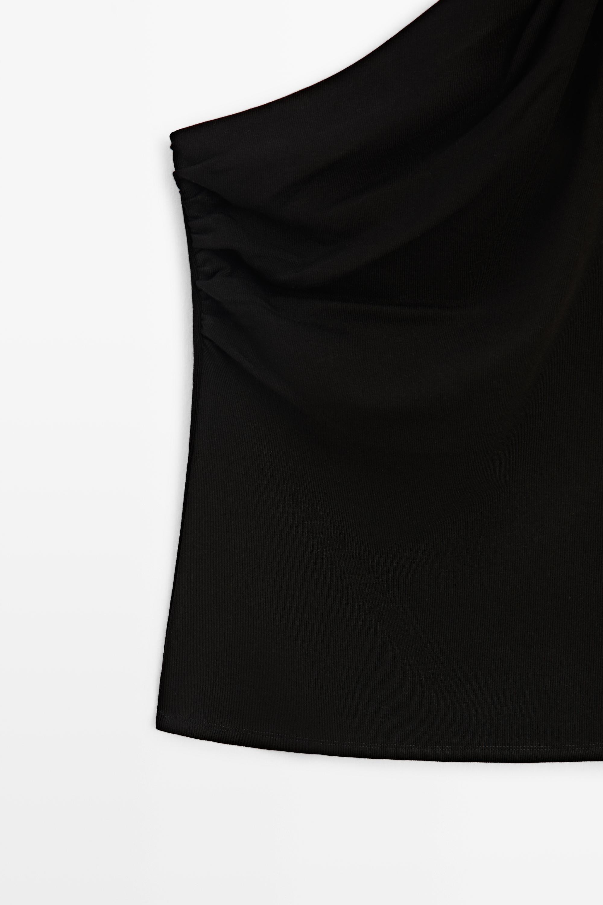 Asymmetric top with metal detail